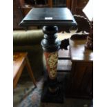 An ebonised and pottery plant stand