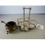 A hallmarked silver salt with spoon, along with a hallmarked silver cruet stand