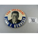 A large John F Kennedy Presidential campaign badge