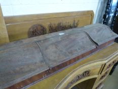 A mahogany desk top storage with three compartments