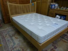 A John Lewis double wooden bed frame and mattress