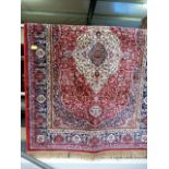 Red ground Kashmir rug