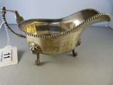 A hallmarked silver sauce boat- 294.5g