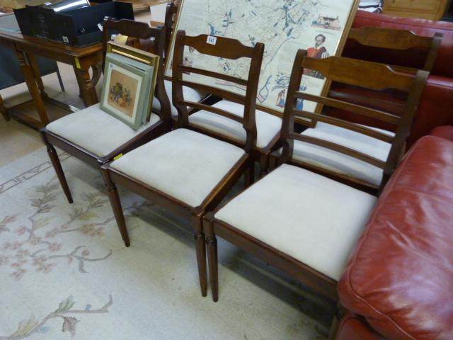 A set of six Regency style dining chairs