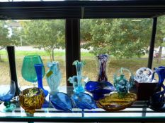 A quantity of coloured glass to include Mdina etc