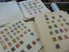 A large quantity of various stamps on loose leaves