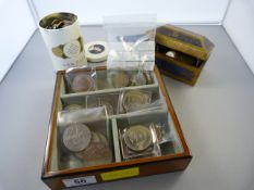 A collection of various coins, badges etc.