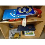 A quantity of various sporting memorabilia, including rattles,scarves, coins etc.