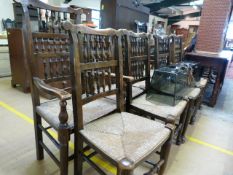 A set of 8 rush seated country chairs including two carvers