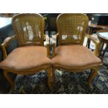 A pair of lattice back mahogany framed carver chairs