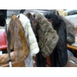 A quantity of fur and faux coats, stoles and hats