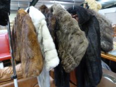 A quantity of fur and faux coats, stoles and hats