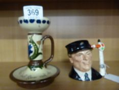 A limited edition Royal Doulton character jug "The Engine Driver" D6823 and a Torquay ware