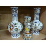 A pair of Delft onion vases and a pair of similar candlesticks