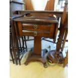 A Victorian drop leaf centre table with two drawers