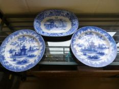 Three blue and white plates