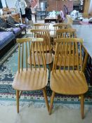 A set of six Ercol style blond dining chairs