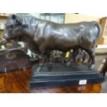 A Large cast bronze of a Bull on Plinth stamped Debut