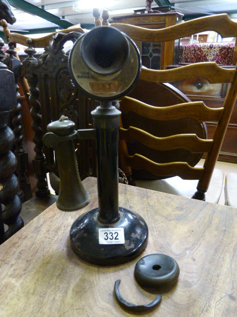 A vintage brass and bakelite stick telephone- damage to bakelite ear piece
