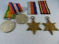 Set of four WW2 medals- Defence medal, war medal, 1939-45 star and Burma star