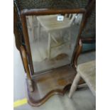 A mahogany toilet mirror