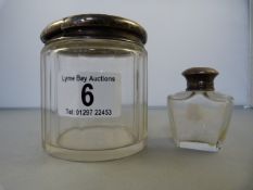 A glass jar with hallmarked silver top A/F and one other