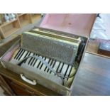 A Vintage Hohner L'organola paino accordian