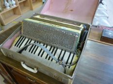 A Vintage Hohner L'organola paino accordian