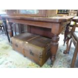 A Victorian extending mahogany dining table with extra leaf