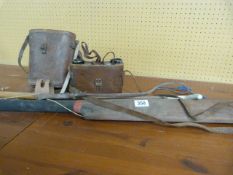 Cricket bat, bow - (arrows in office) and a pair of binoculars etc