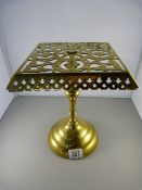 A Victorian brass trivet