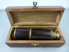 A leather bound four draw telescope