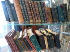 A quantity of leather bound books
