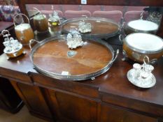 A large oak serving tray, Silver plated condiment sets, an oak bowl with lion head finales etc.