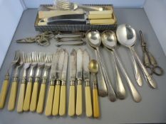 A small quantity of silverplated cutlery to include a pair of grape spoons - possibly silver