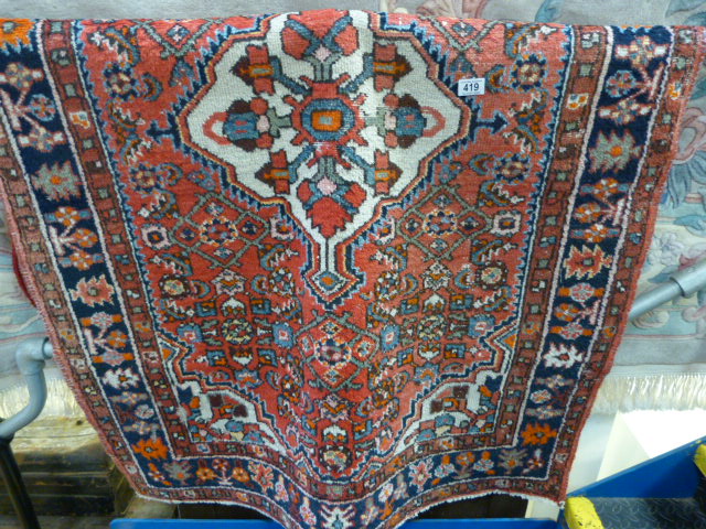 Eastern red ground rug