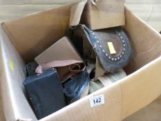 Two gas masks in original boxes and a babies respirator/gas mask
