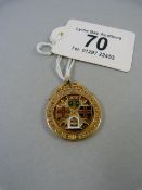 Newcastle United A.F.C interest- A 1910/11 Newcastle United AFC 9ct gold medallion, with four