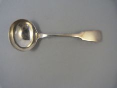 A hallmarked silver ladle dated 1828, London- weight 57.5g