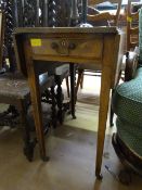 An oak drop leaf table