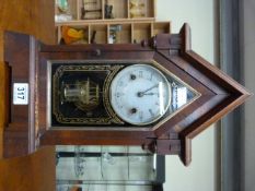 A Veneered mantle clock