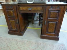 A Mahogany carved ladies twin pedestal writing desk