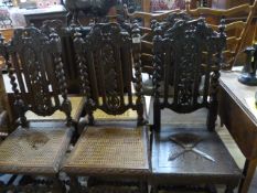 A harlequin set of carved chairs with rush seats and some wooden