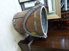 An brass bound oak bucket with rope handle