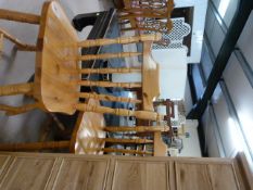 Two pine dining room chairs