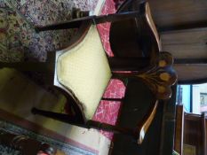 An Edwardian corner chair with inlaid floral decoration to back