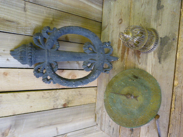 A Salter weighing scale and a wall plaque and a bird cage