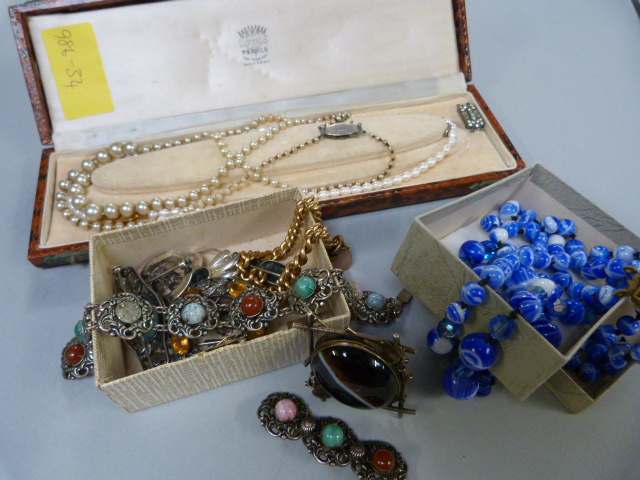 Small quantity of costume jewellery to include glass beads, hallmarked silver brooches and pearls