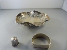 Silver hallmarked Bon Bon dish with silver napkin ring and thimble (worn hallmarks). 130g.