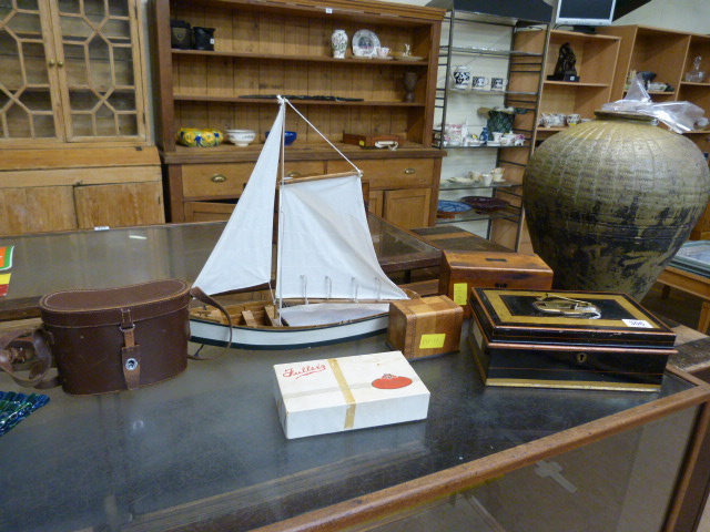 A Vintage cash tin, jewellery box and one other, set of Boxed Cigarette cards and a model boat